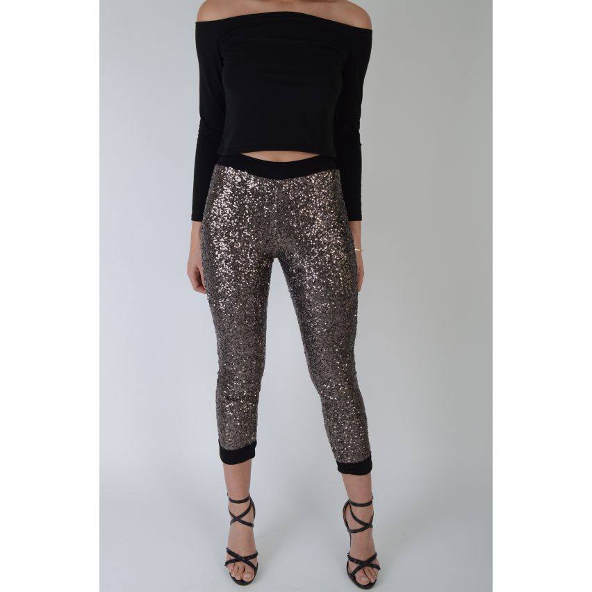 Leggings de lentejuelas de oro Lovemystyle con pretina negra - muestra
