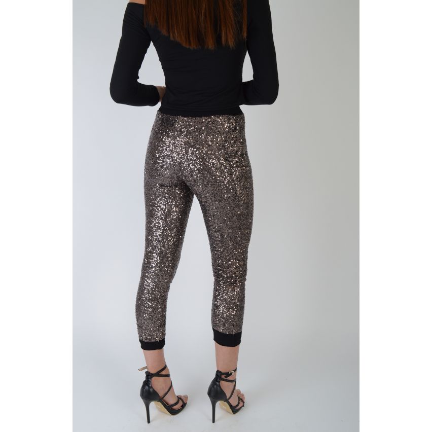 Leggings de lentejuelas de oro Lovemystyle con pretina negra - muestra